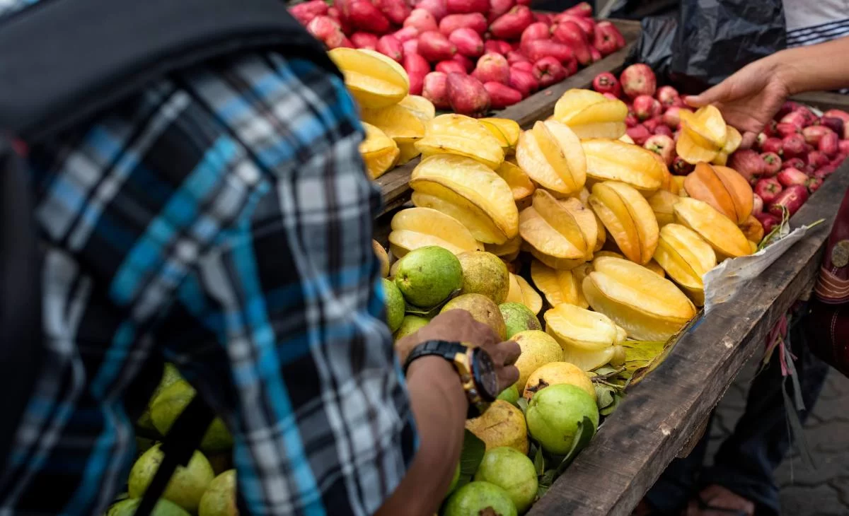 Muslim fruit vendor